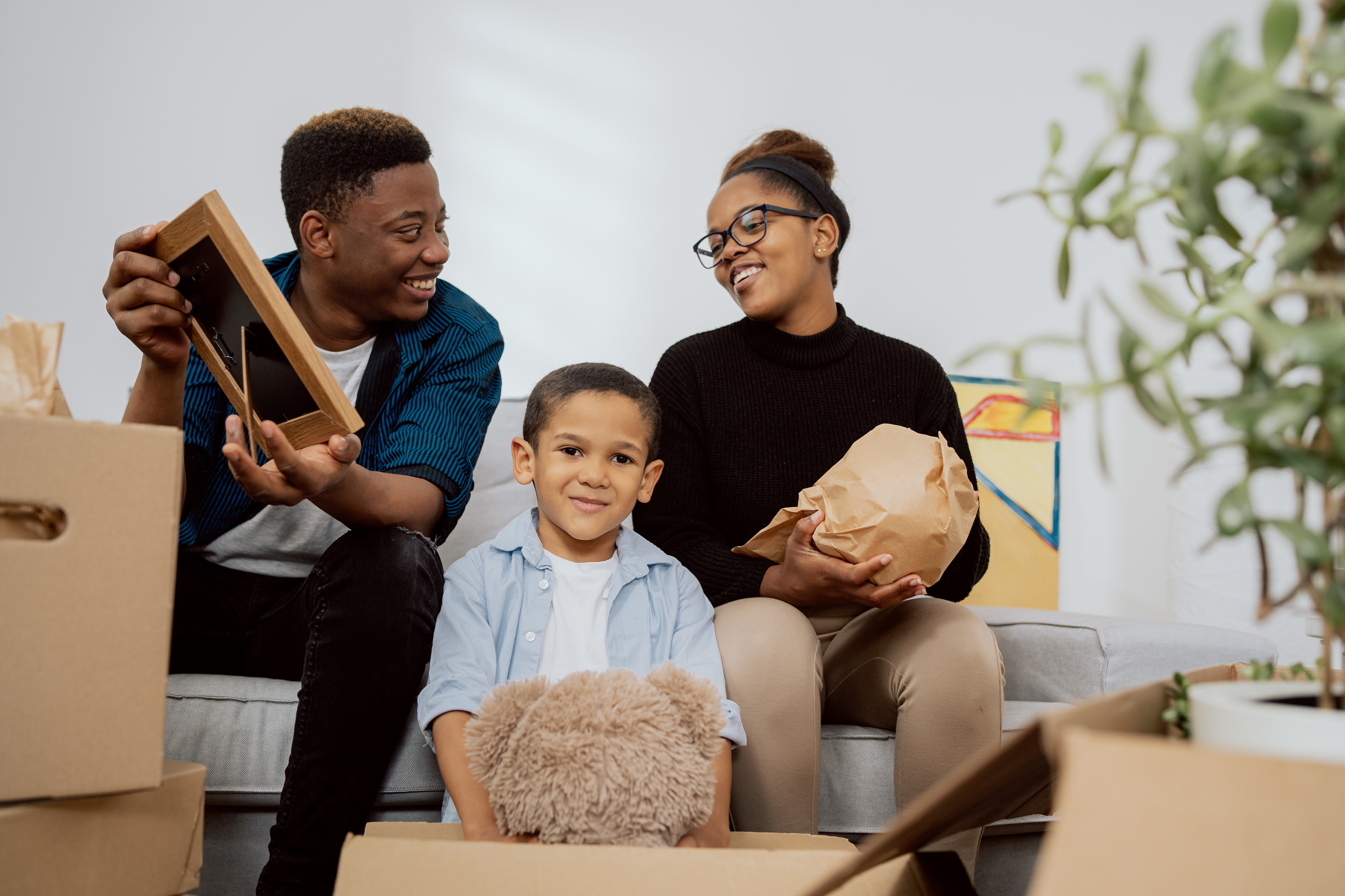 African_american_family_decluttering_AdobeStock_473998094